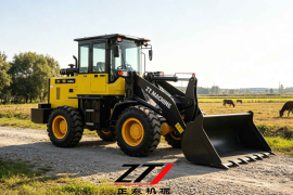 Cargadora de ruedas compacta ZT928A trabajando en un terreno agrícola.
